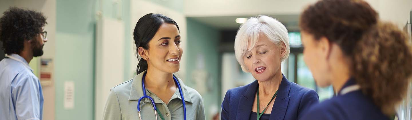 A group of medical practitioners in a hallway